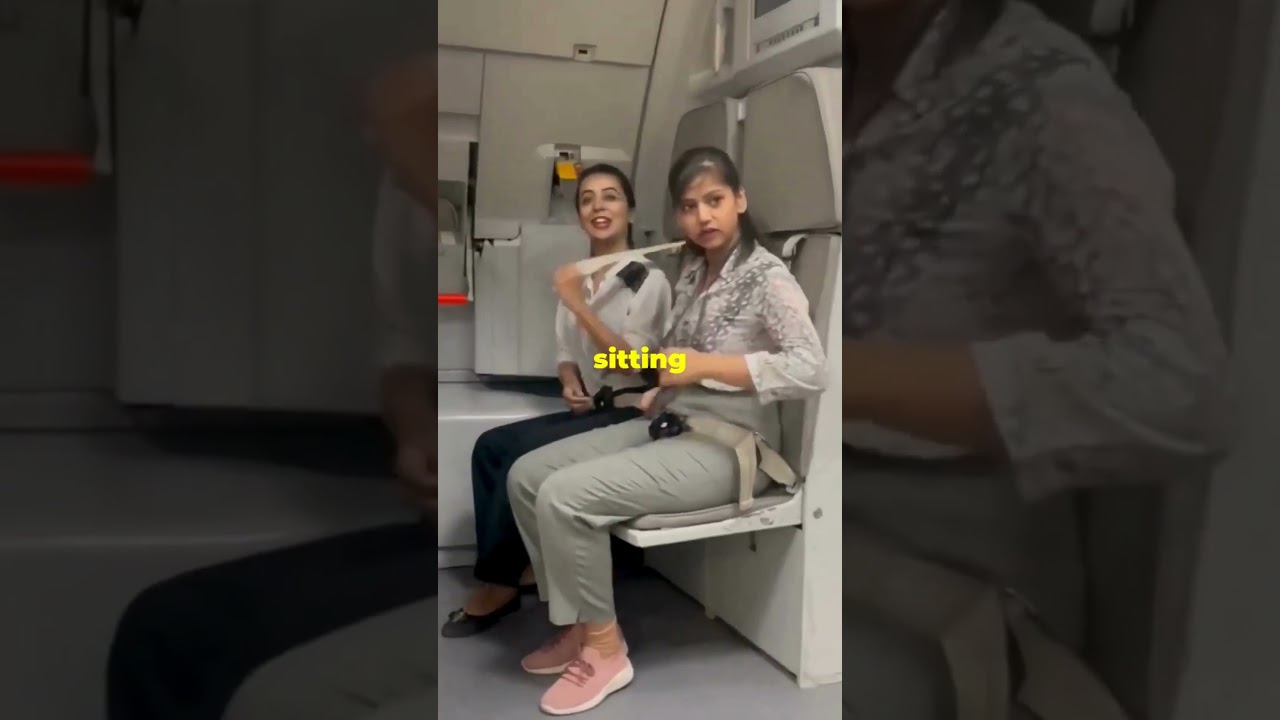 Why Cabin Crew Sit on Their Hands During Takeoff and Landing! #shorts