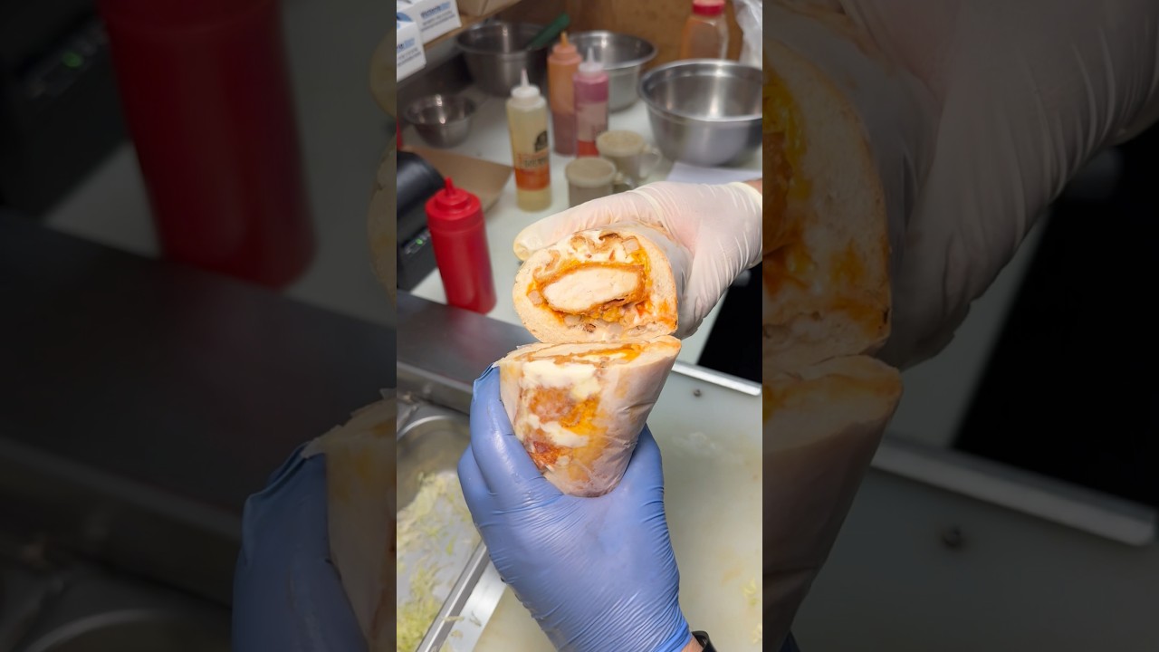 The Fat Mr. Sub: loaded with chicken cheesesteak, buffalo sauce, lettuce, tomato, and blue cheese.